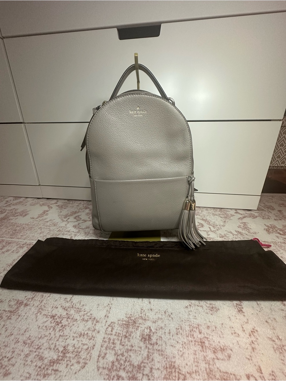 kate spade Pebble Leather Light Gray Backpack with Tassel